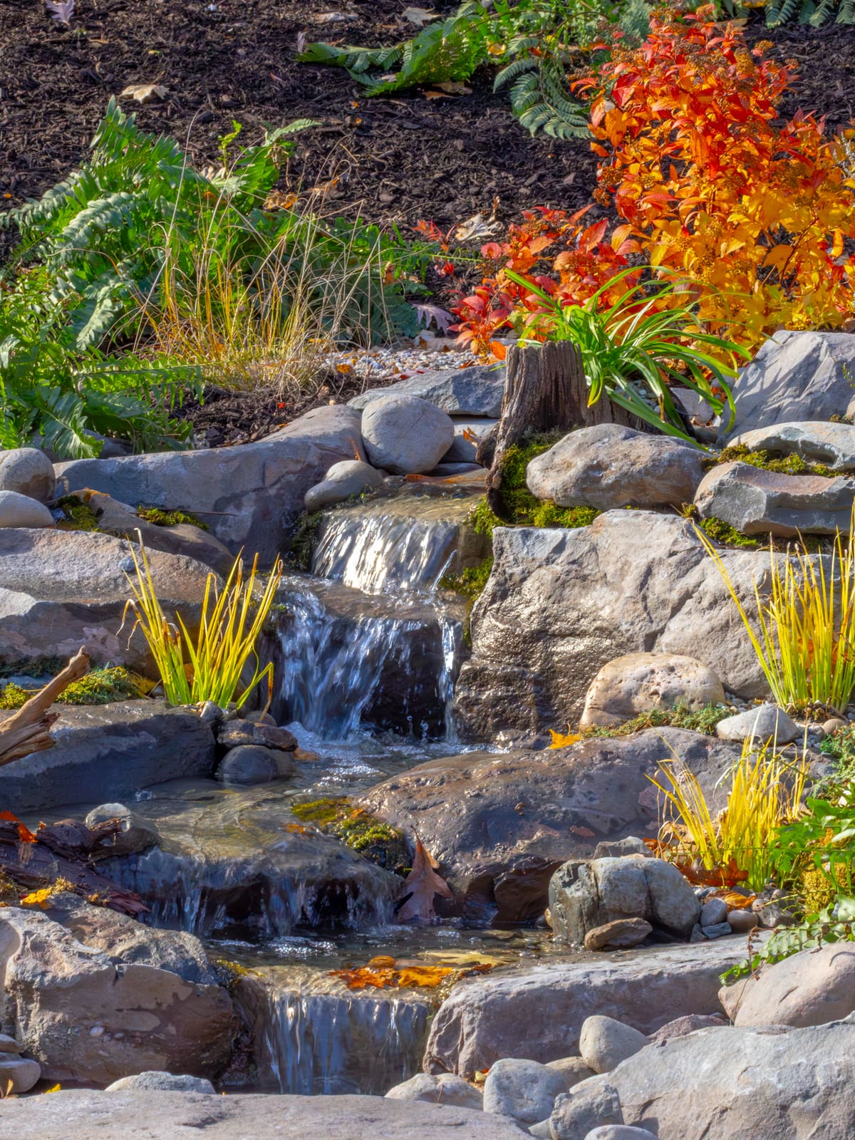 Water cascading over natural stone